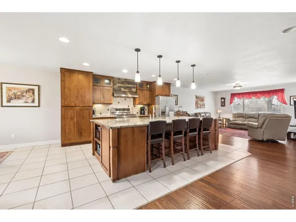 a room with lots of chairs and appliances
