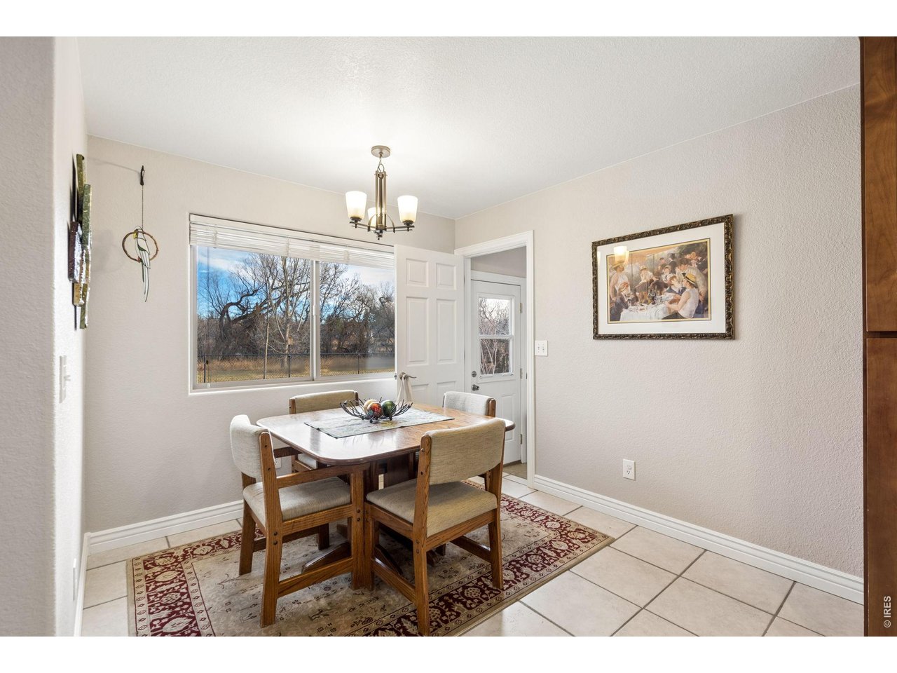 3000 Marion Street Fort Collins, CO 80521 - Photo 15 of 50 a view of a dining room with furniture and window