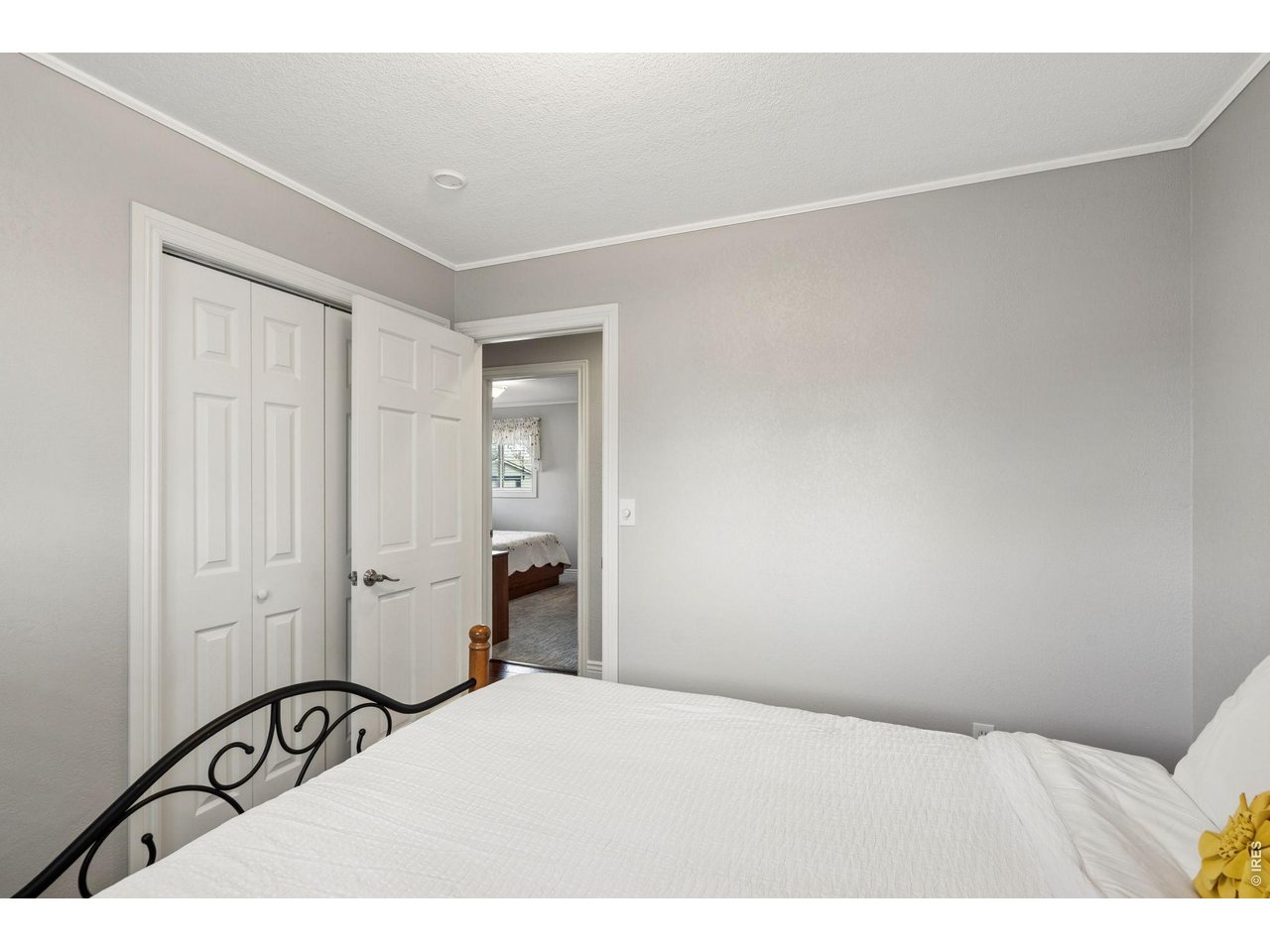 3000 Marion Street Fort Collins, CO 80521 - Photo 23 of 50 a bedroom with a bed and cabinets