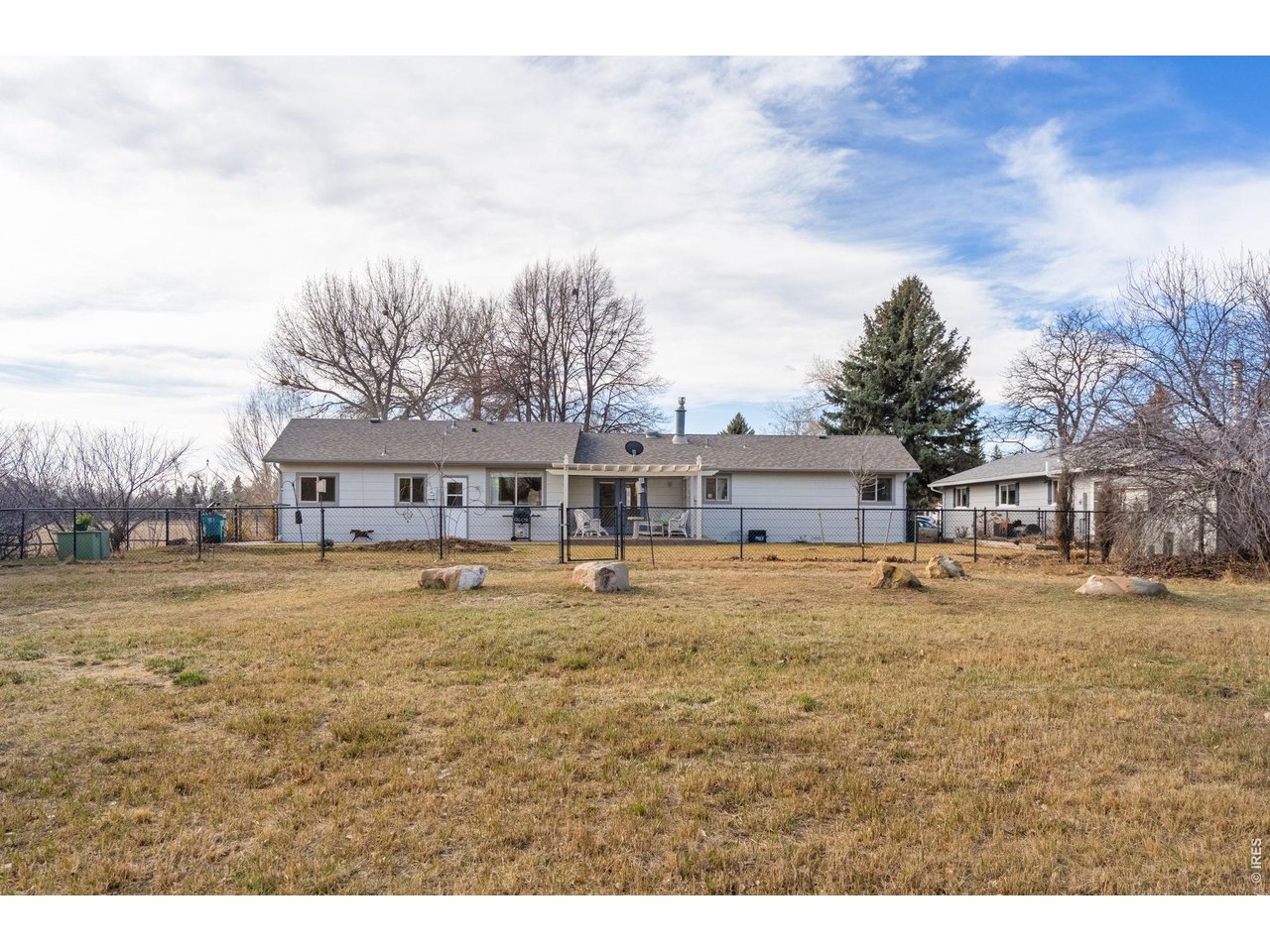 3000 Marion Street Fort Collins, CO 80521 - Photo 48 of 50 a swimming pool is sitting in front of a house and a yard