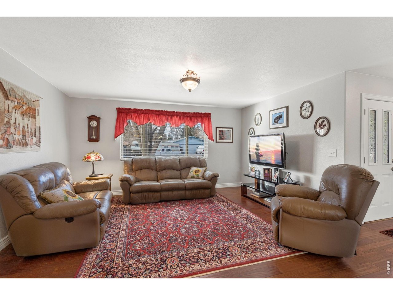 3000 Marion Street Fort Collins, CO 80521 - Photo 5 of 50 a living room with furniture and a flat screen tv