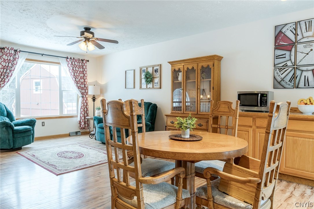291 Dutch Hill Road Parish, NY 13167 - Photo 11 of 34 Another view of the Living room/Dining room showin