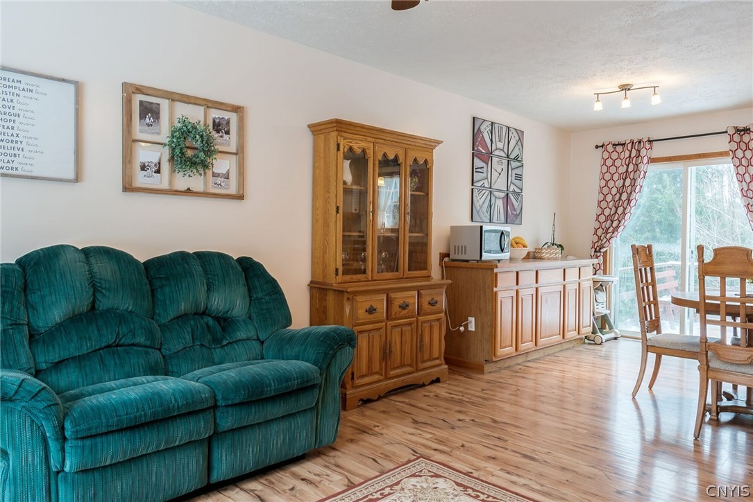 291 Dutch Hill Road Parish, NY 13167 - Photo 7 of 34 Living room/Dining room showing lots of room to ac