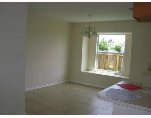 a room with window and a bed