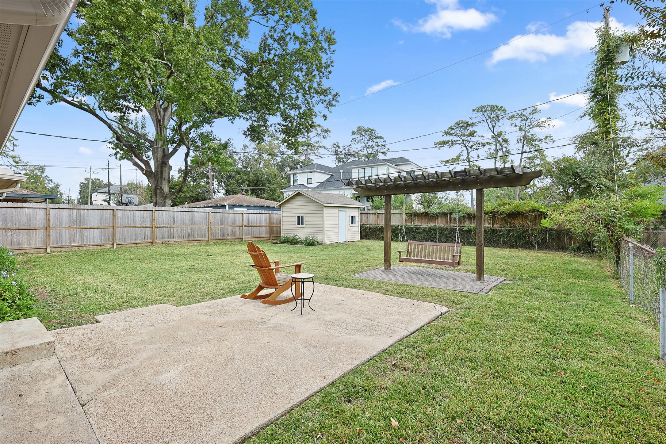 2015 Woodcrest Drive Houston, TX 77018 - Photo 22 of 30 Another look at the backyard with patio and storage shed.