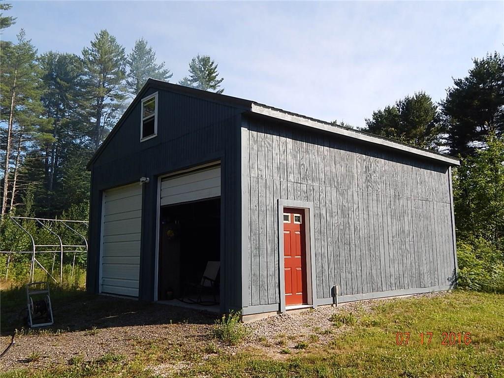 45 Hemlock Cove Road Hollis, ME 04042 - Photo 7 of 24 Expansive garage on dry slab with...
