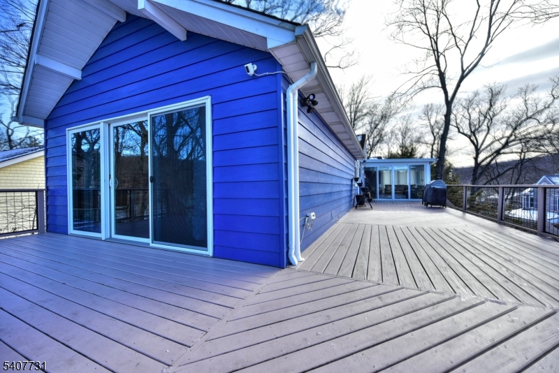 7 Birch Road Bloomingdale, NJ 07403 - Photo 27 of 45 a view of backyard with a deck and wooden floor