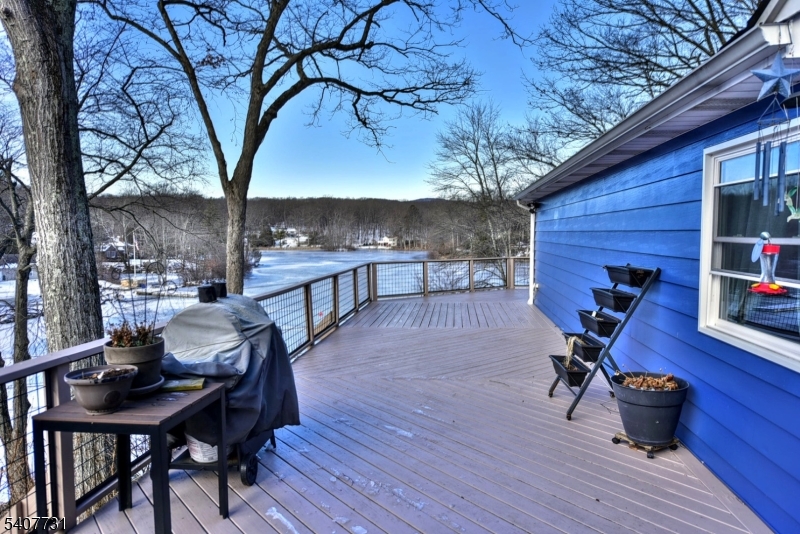 7 Birch Road Bloomingdale, NJ 07403 - Photo 29 of 45 a view of a chairs and table on the deck