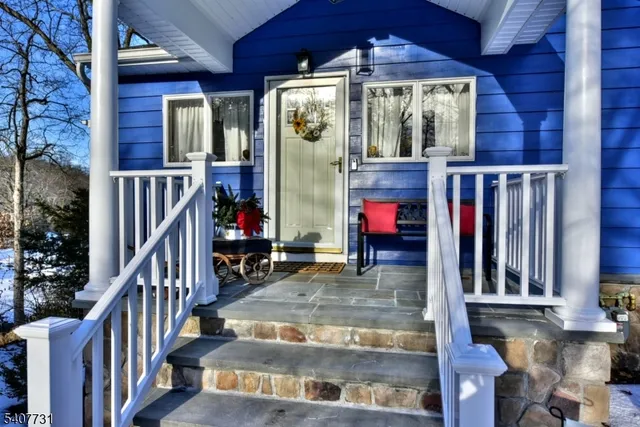 a kitchen with a sink appliances and cabinets