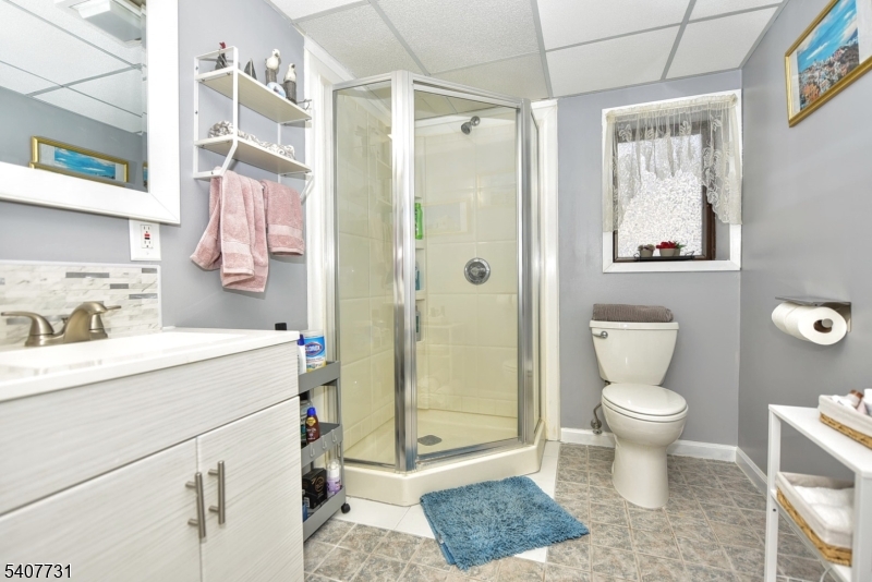 7 Birch Road Bloomingdale, NJ 07403 - Photo 36 of 45 a bathroom with a sink toilet and shower
