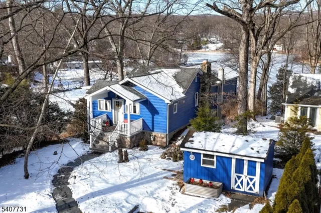 a kitchen with a stove a sink and a refrigerator