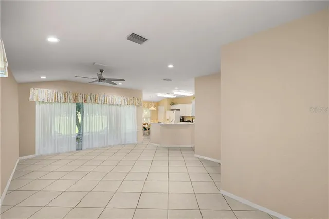 a view of an empty room and window