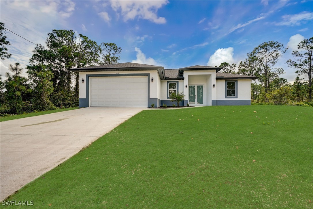 3911 Sunset Road Lehigh Acres, FL 33971 - Photo 1 of 21