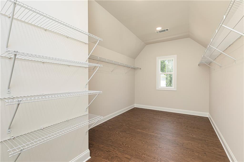 2475 Stewart Road Cumming, GA 30041 - Photo 22 of 30 a view of a room with racks on the wall