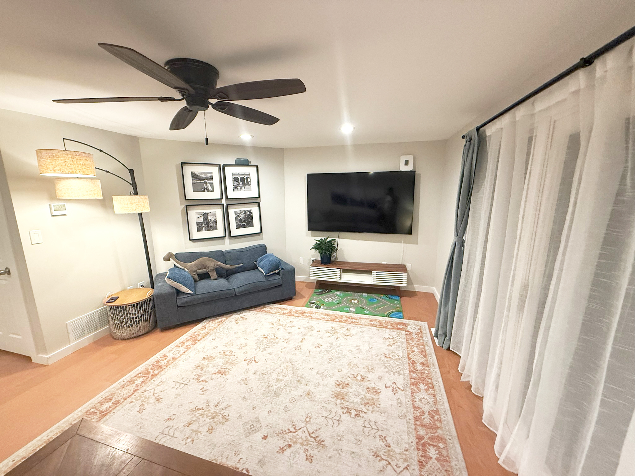 45 Mattabasset Drive, Unit 45 Meriden, CT 06450 - Photo 13 of 40 a living room with furniture and a flat screen tv