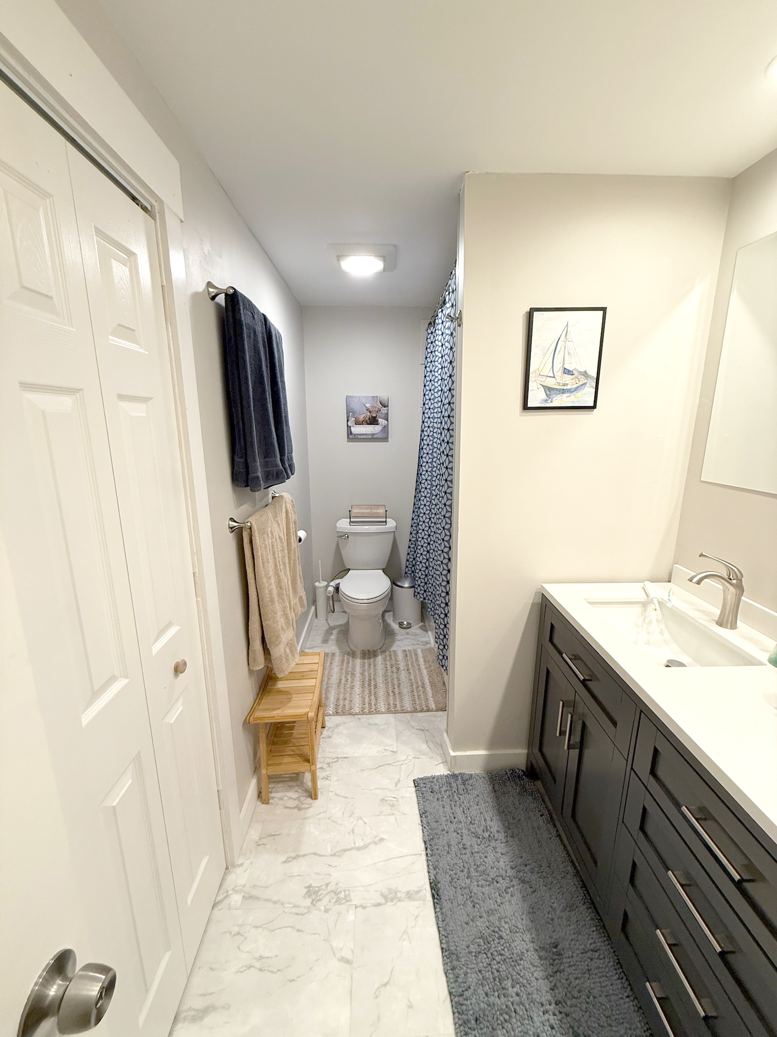 45 Mattabasset Drive, Unit 45 Meriden, CT 06450 - Photo 23 of 40 a living room with a sink furniture and a flat screen tv