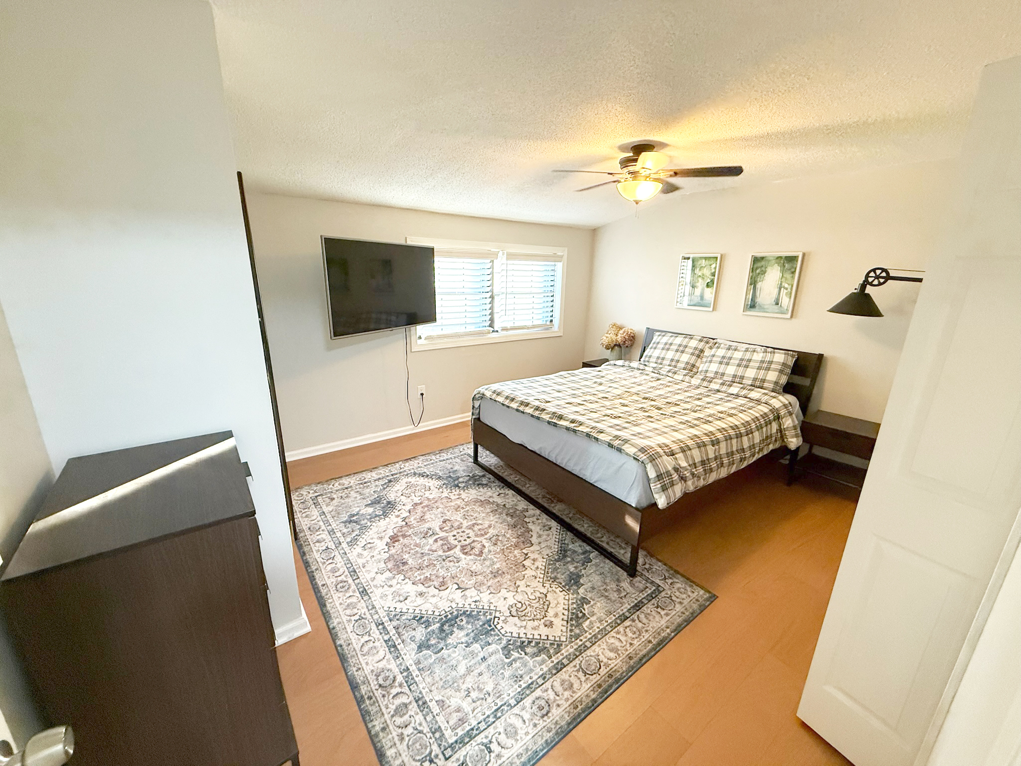 45 Mattabasset Drive, Unit 45 Meriden, CT 06450 - Photo 27 of 40 a bedroom with a bed and flat screen tv