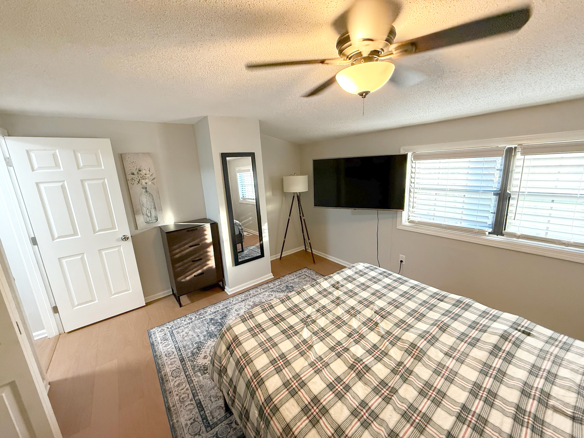 45 Mattabasset Drive, Unit 45 Meriden, CT 06450 - Photo 29 of 40 a bedroom with a bed and a flat screen tv