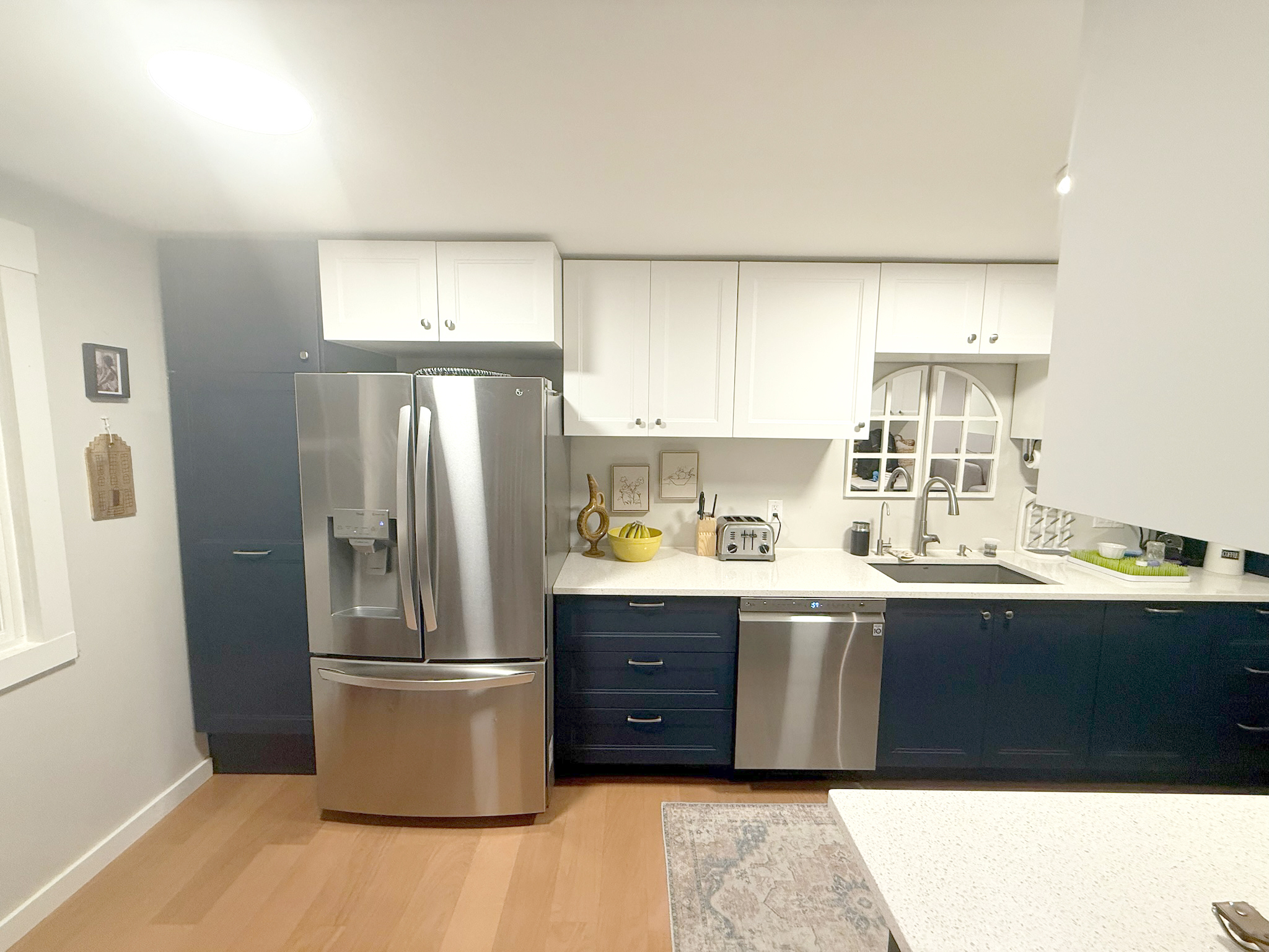 45 Mattabasset Drive, Unit 45 Meriden, CT 06450 - Photo 6 of 40 a kitchen with stainless steel appliances granite countertop a refrigerator a sink a stove and white cabinets