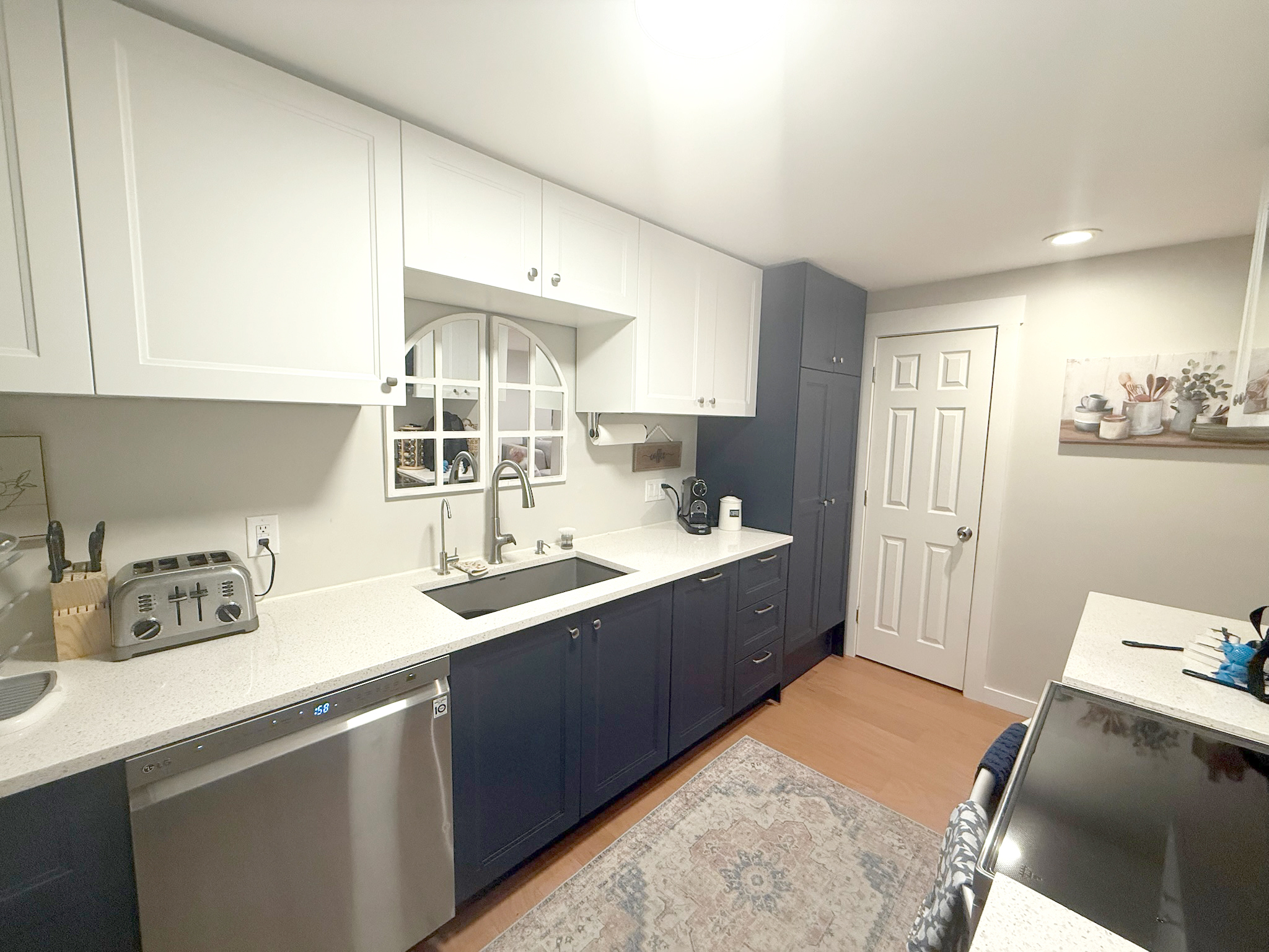 45 Mattabasset Drive, Unit 45 Meriden, CT 06450 - Photo 7 of 40 a kitchen with a sink and cabinets