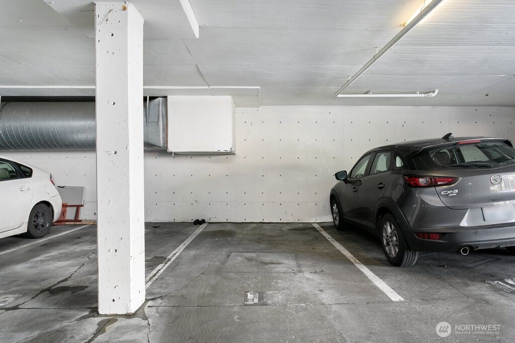 4831 Fauntleroy Way Southwest, Unit 206 Seattle, WA 98116 - Photo 17 of 21 a view of a car in garage