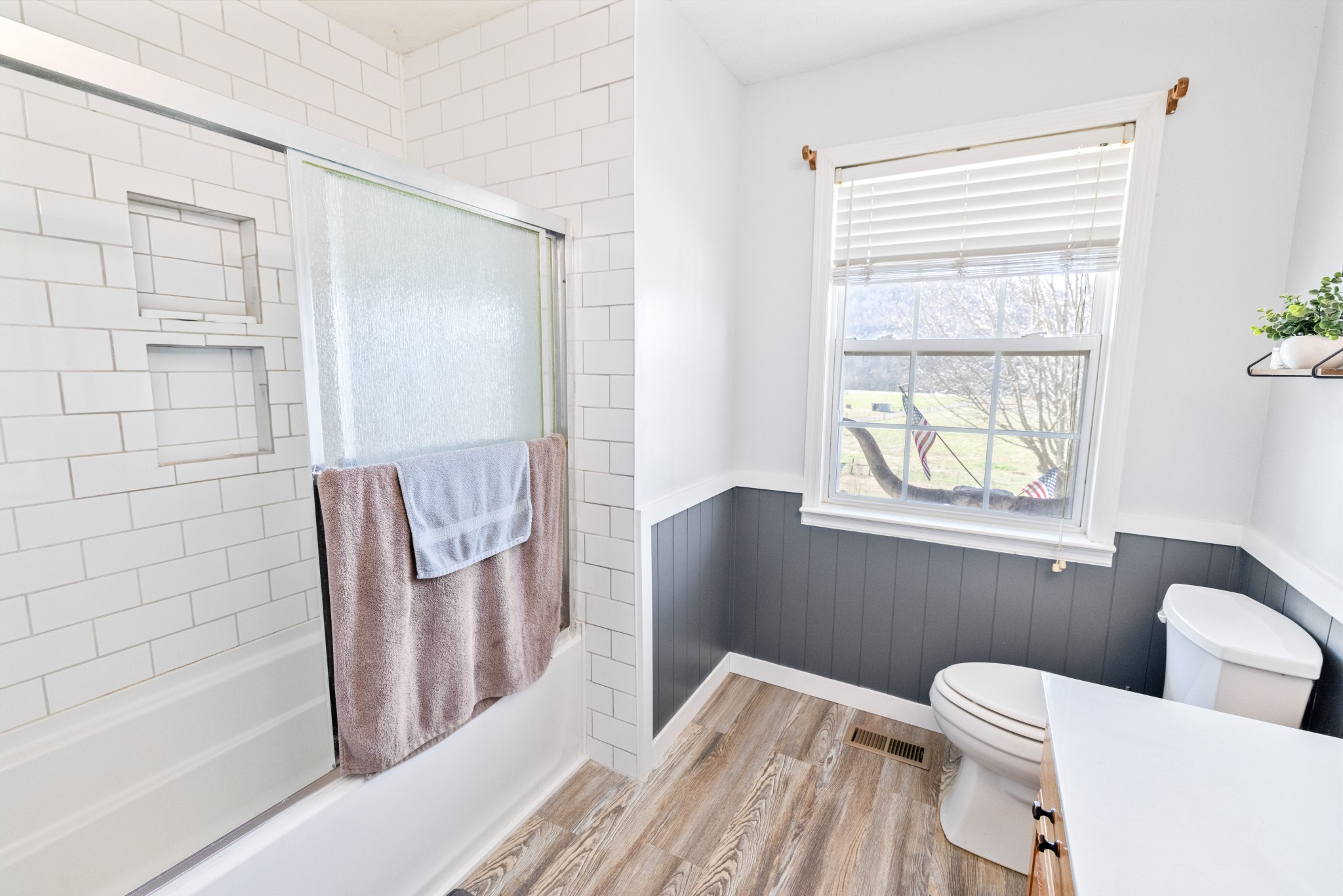 600 East Main Street Dowelltown, TN 37059 - Photo 34 of 54 a bathroom with a toilet a sink and bathtub