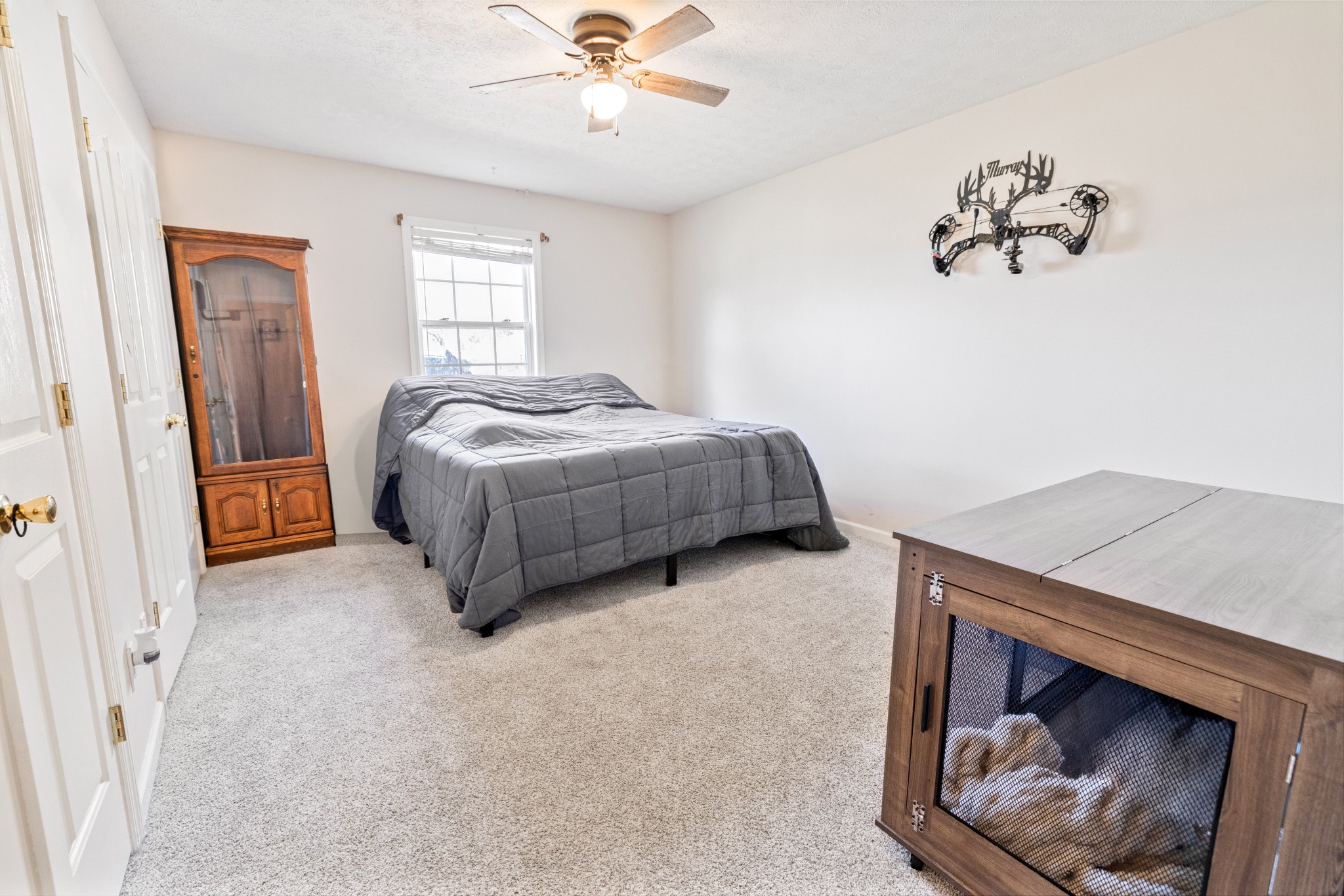 600 East Main Street Dowelltown, TN 37059 - Photo 38 of 54 a living room with a bed and a chandelier