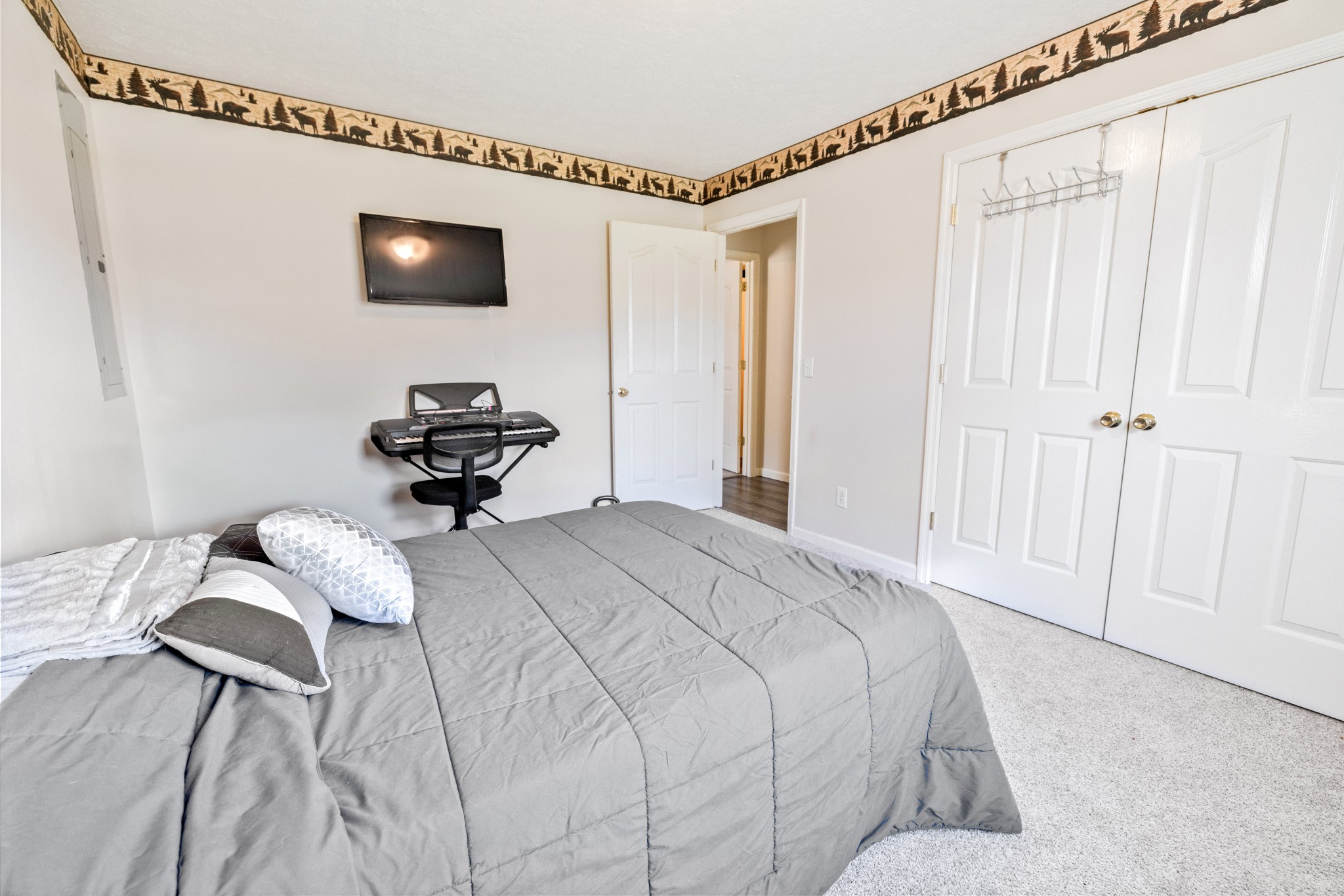 600 East Main Street Dowelltown, TN 37059 - Photo 41 of 54 a bedroom with a bed and a flat screen tv