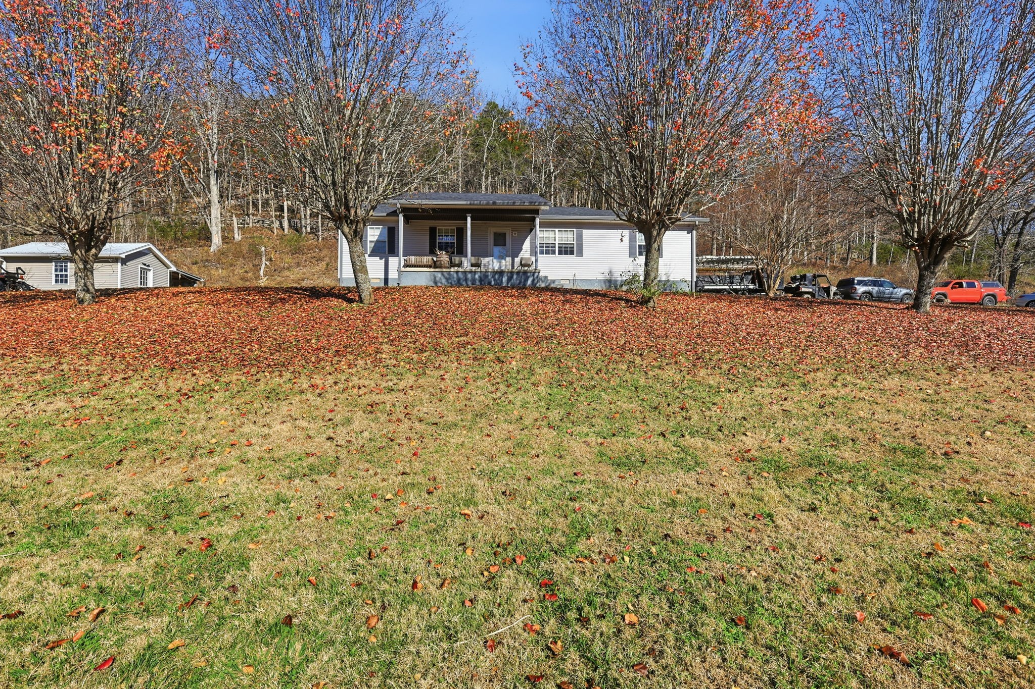 600 East Main Street Dowelltown, TN 37059 - Photo 46 of 54 a front view of a house with a yard covered with snow