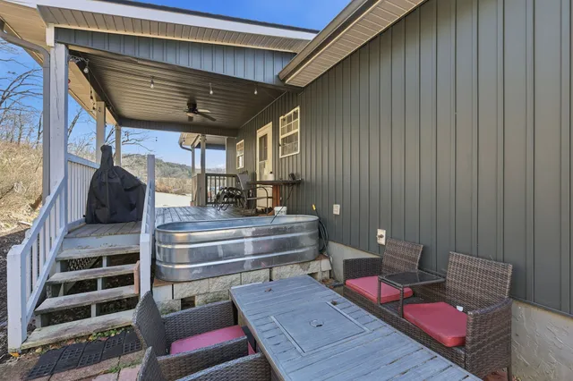 a view of livingroom with couch and wooden floor