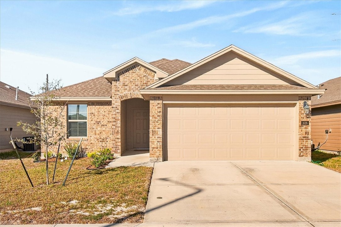 1626 Comfy Way Corpus Christi, TX 78418 - Photo 1 of 40 a view of a house with large windows