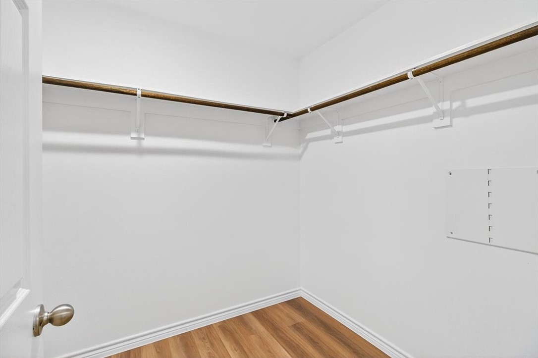 1626 Comfy Way Corpus Christi, TX 78418 - Photo 23 of 40 a view of a room with racks on the wall