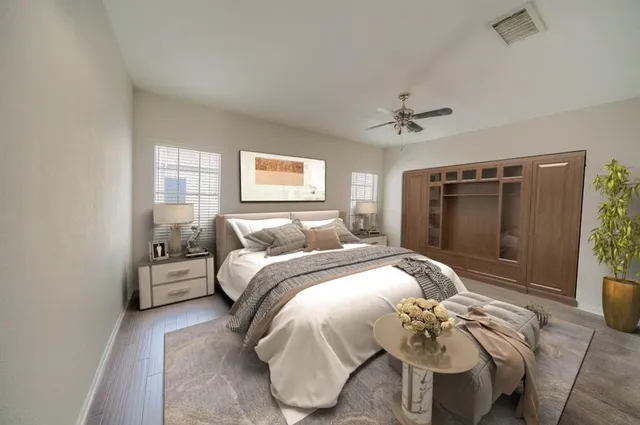 a bed room with a bed and a window