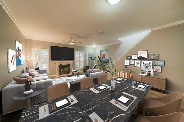 a living room with furniture couches and a flat screen tv