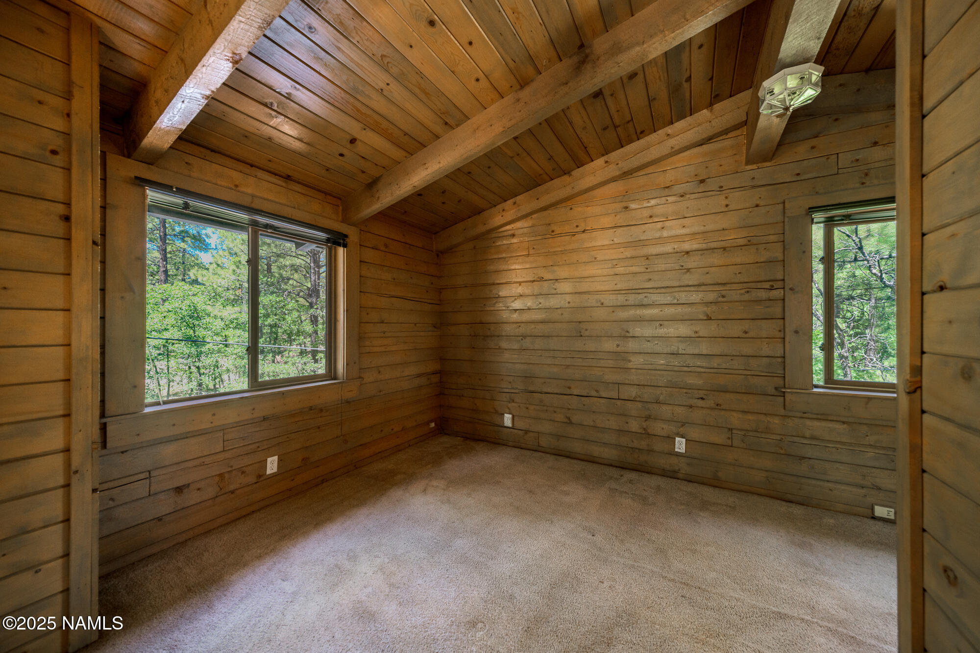 4680 Mormon Lake Road Mormon Lake, AZ 86038 - Photo 18 of 34 a view of an empty room with a window