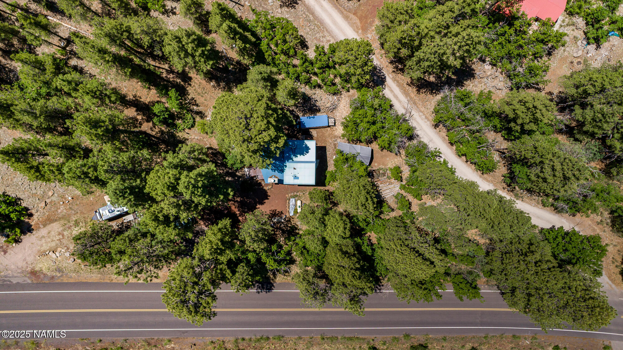 4680 Mormon Lake Road Mormon Lake, AZ 86038 - Photo 28 of 34 an aerial view of residential house with outdoor space and trees all around