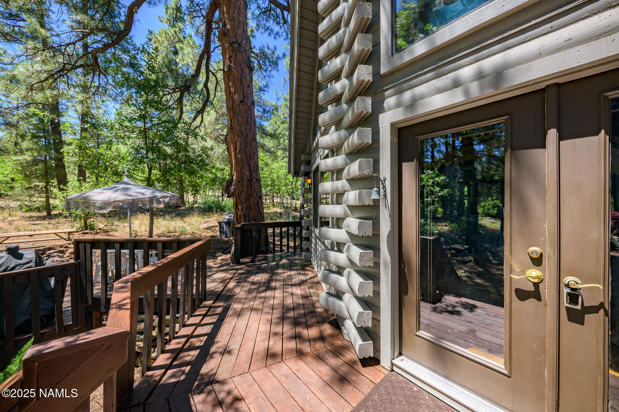 4680 Mormon Lake Road Mormon Lake, AZ 86038 - Photo 5 of 34 a view of a balcony with an outdoor space