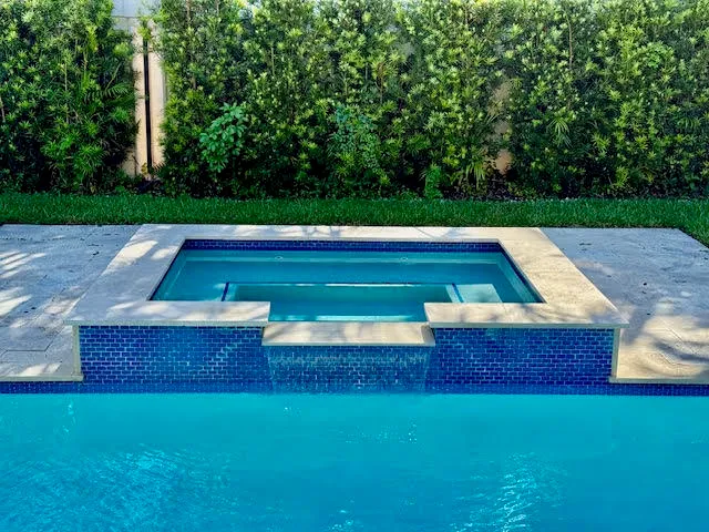a view of swimming pool with a yard