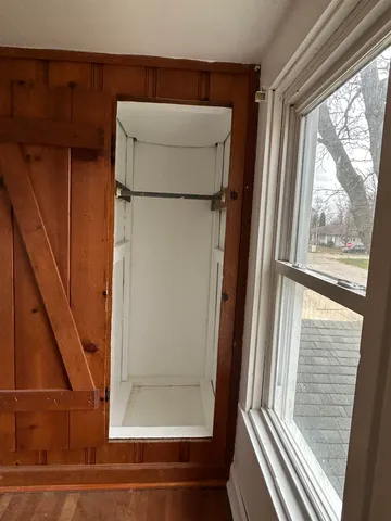 a bathroom with a glass shower door