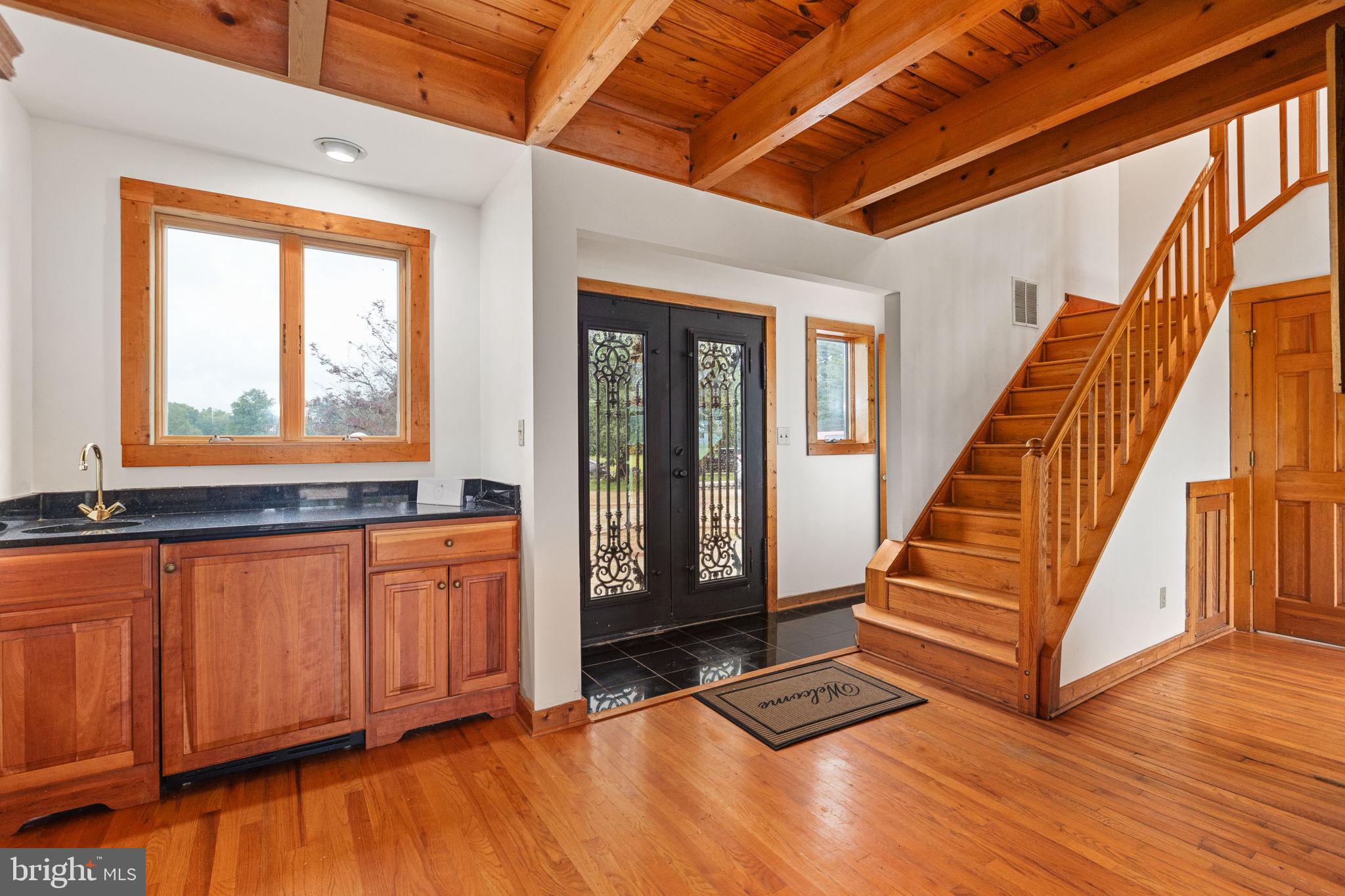 6119 Beach Road Midland, VA 22728 - Photo 6 of 98 a view of an entryway with wooden floor and door