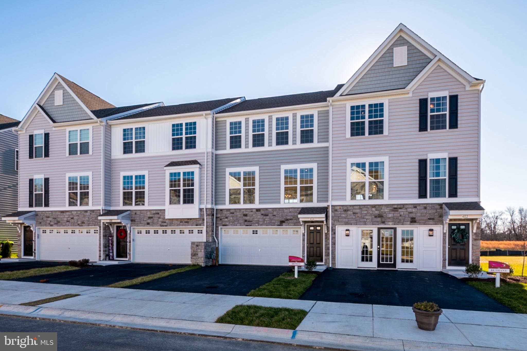 203 Case Road Townsend, DE 19734 - Photo 2 of 24 a front view of a building with many windows