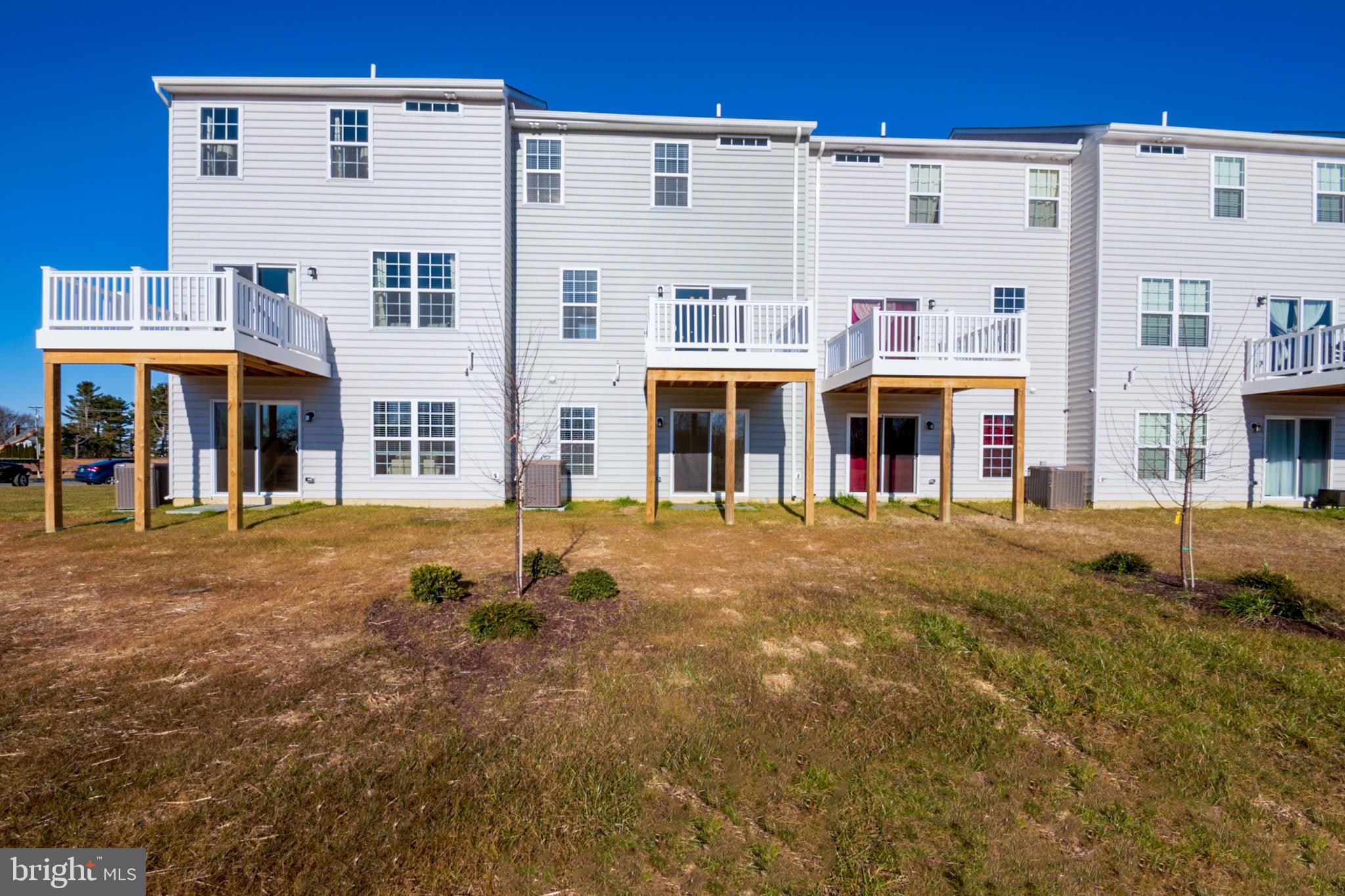 203 Case Road Townsend, DE 19734 - Photo 3 of 24 a front view of a building with a street