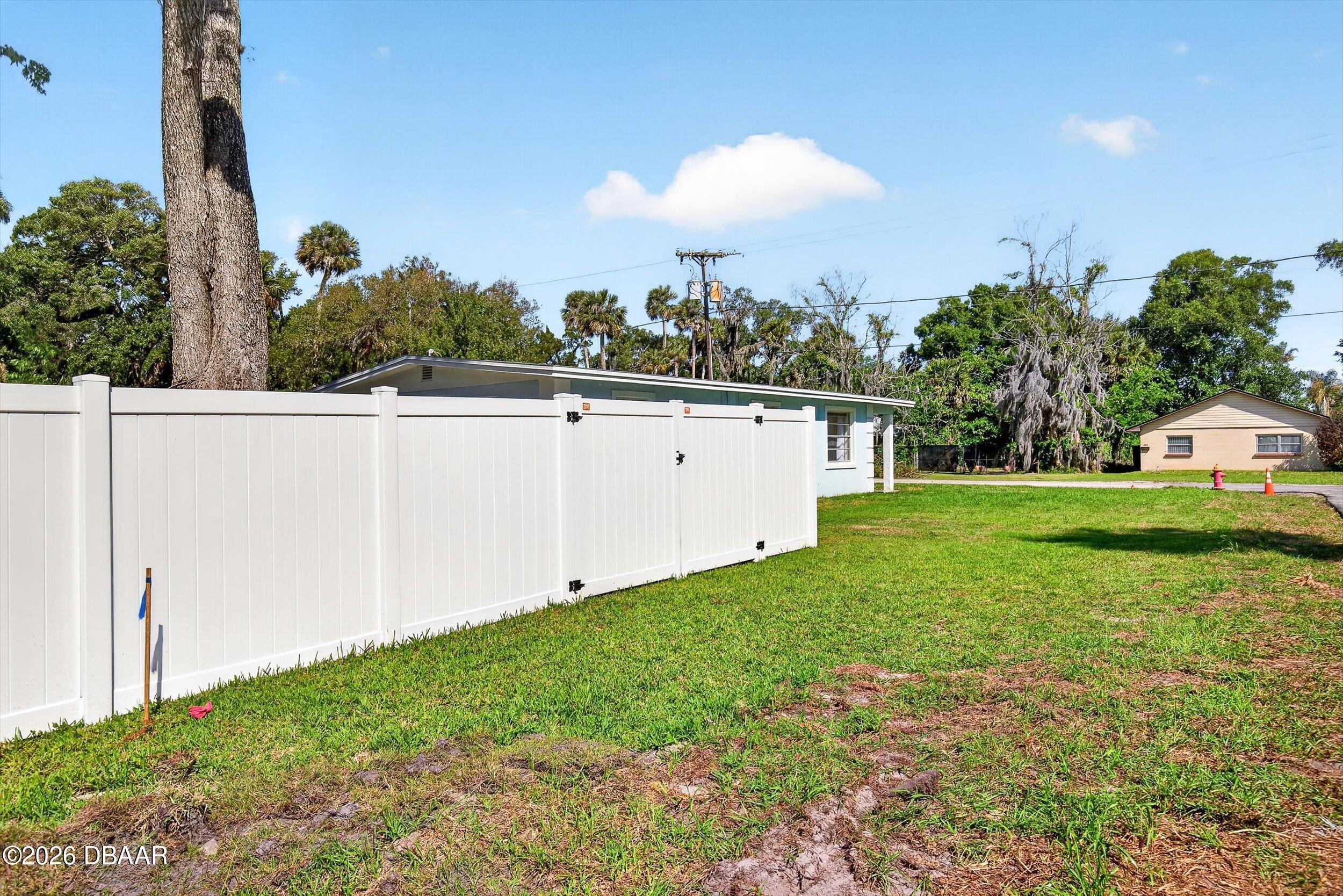 128 Oak Ridge Avenue Edgewater, FL 32132 - Photo 48 of 65 exterior fence