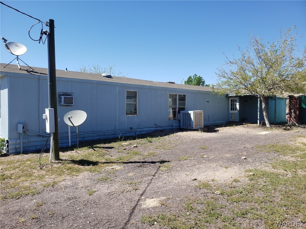 14185 Powerline Road Kingman, AZ 86401 - Photo 3 of 22 a view of a house with a patio