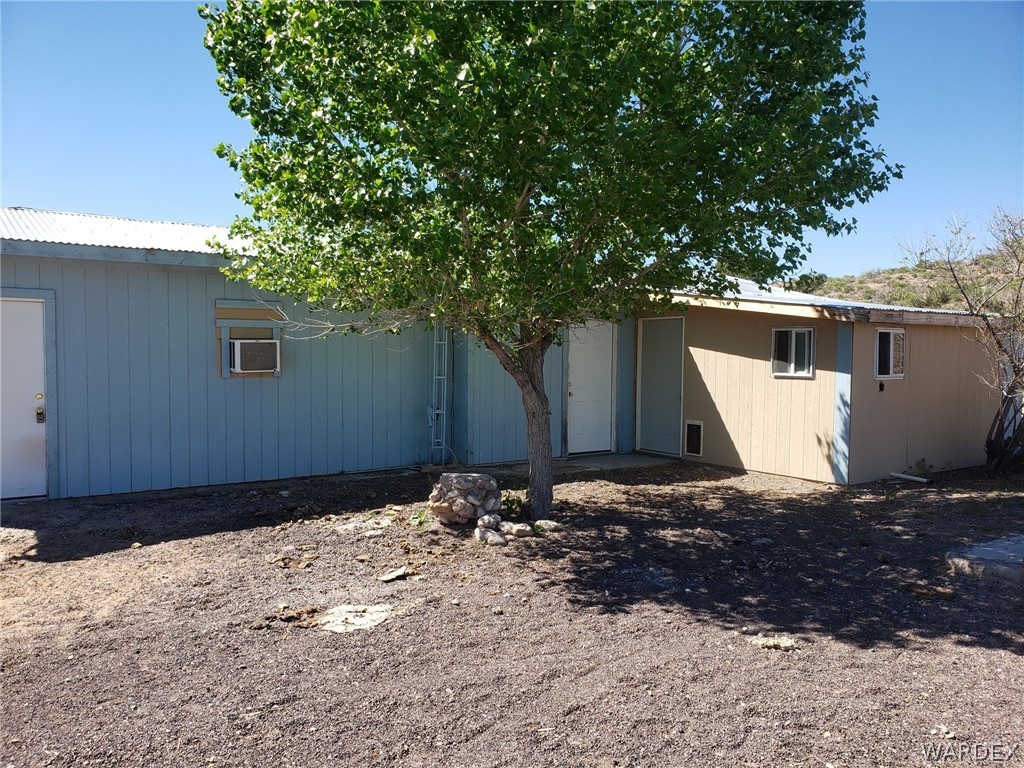 14185 Powerline Road Kingman, AZ 86401 - Photo 5 of 22 a view of a house with a tree