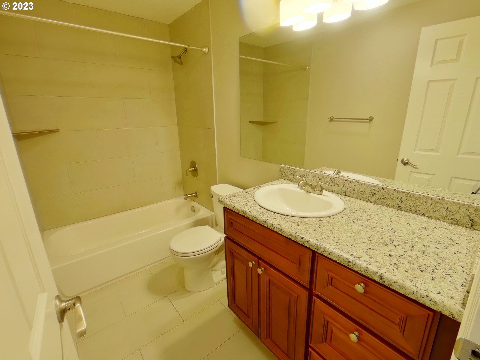 925 Anderson Lane Springfield, OR 97477 - Photo 11 of 19 a bathroom with a granite countertop sink toilet and shower