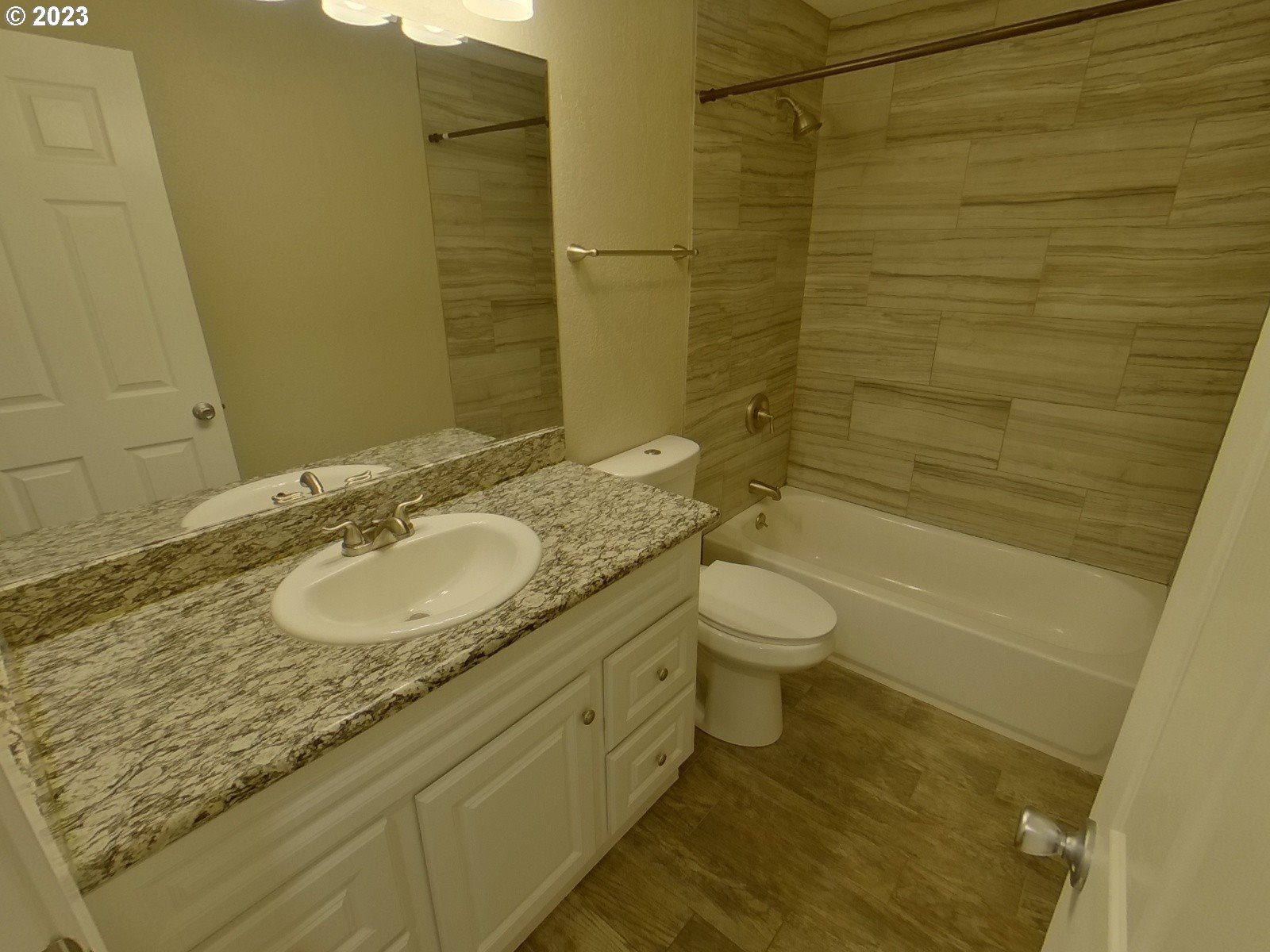 925 Anderson Lane Springfield, OR 97477 - Photo 3 of 19 a bathroom with a granite countertop sink toilet and shower