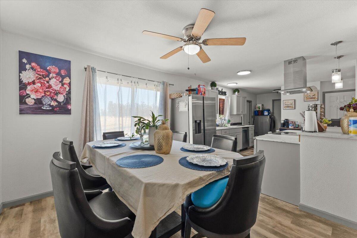 10755 Cody Drive Red Bluff, CA 96080 - Photo 11 of 77 a dining room with furniture and window