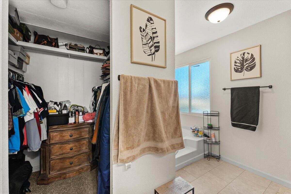 10755 Cody Drive Red Bluff, CA 96080 - Photo 22 of 77 a view of a livingroom with furniture and a flat screen tv