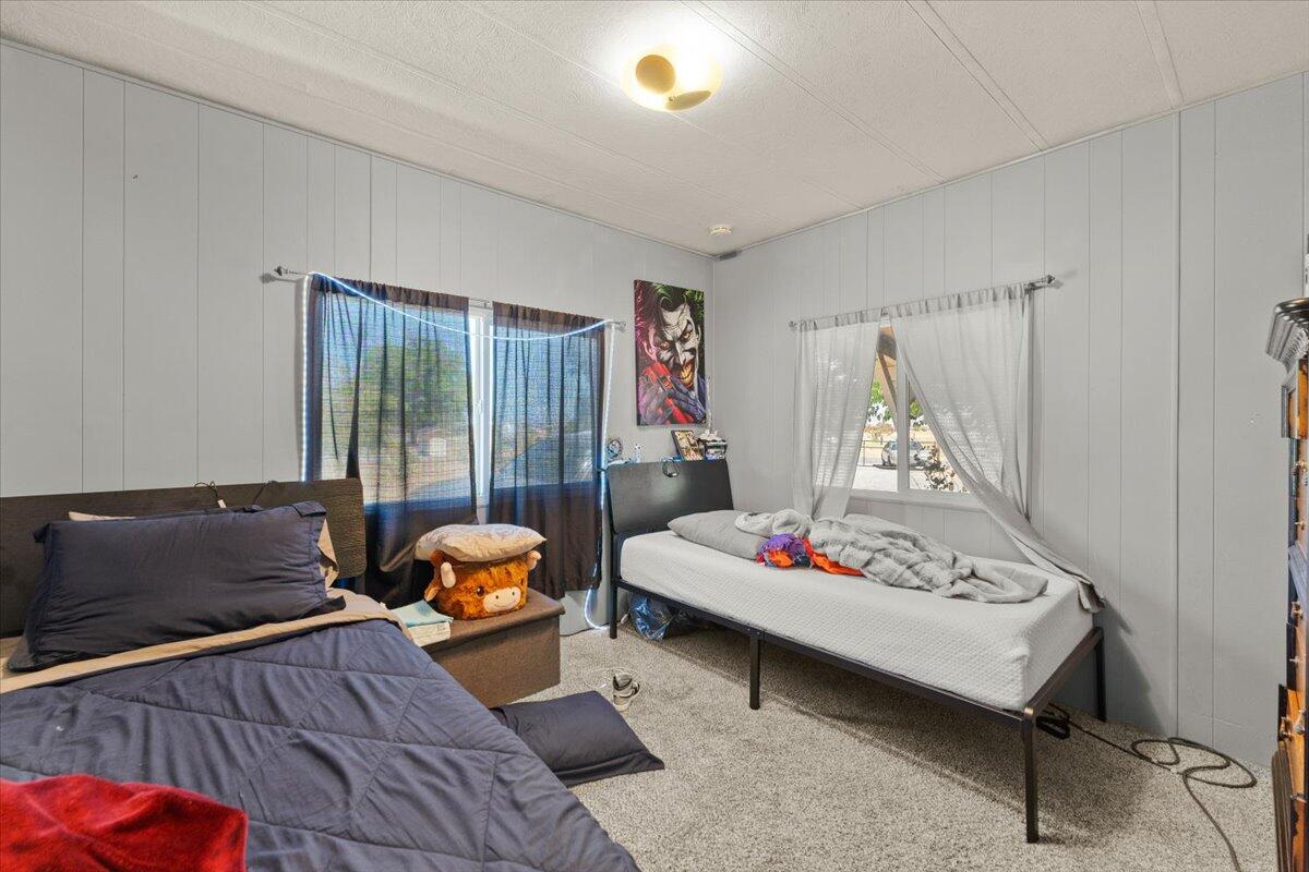 10755 Cody Drive Red Bluff, CA 96080 - Photo 27 of 77 a bedroom with a bed and a window
